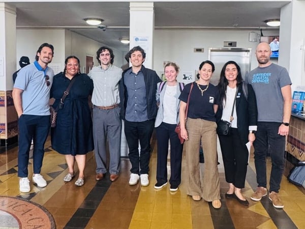 Surfrider volunteers in the Santa Monica City Hall before speaking